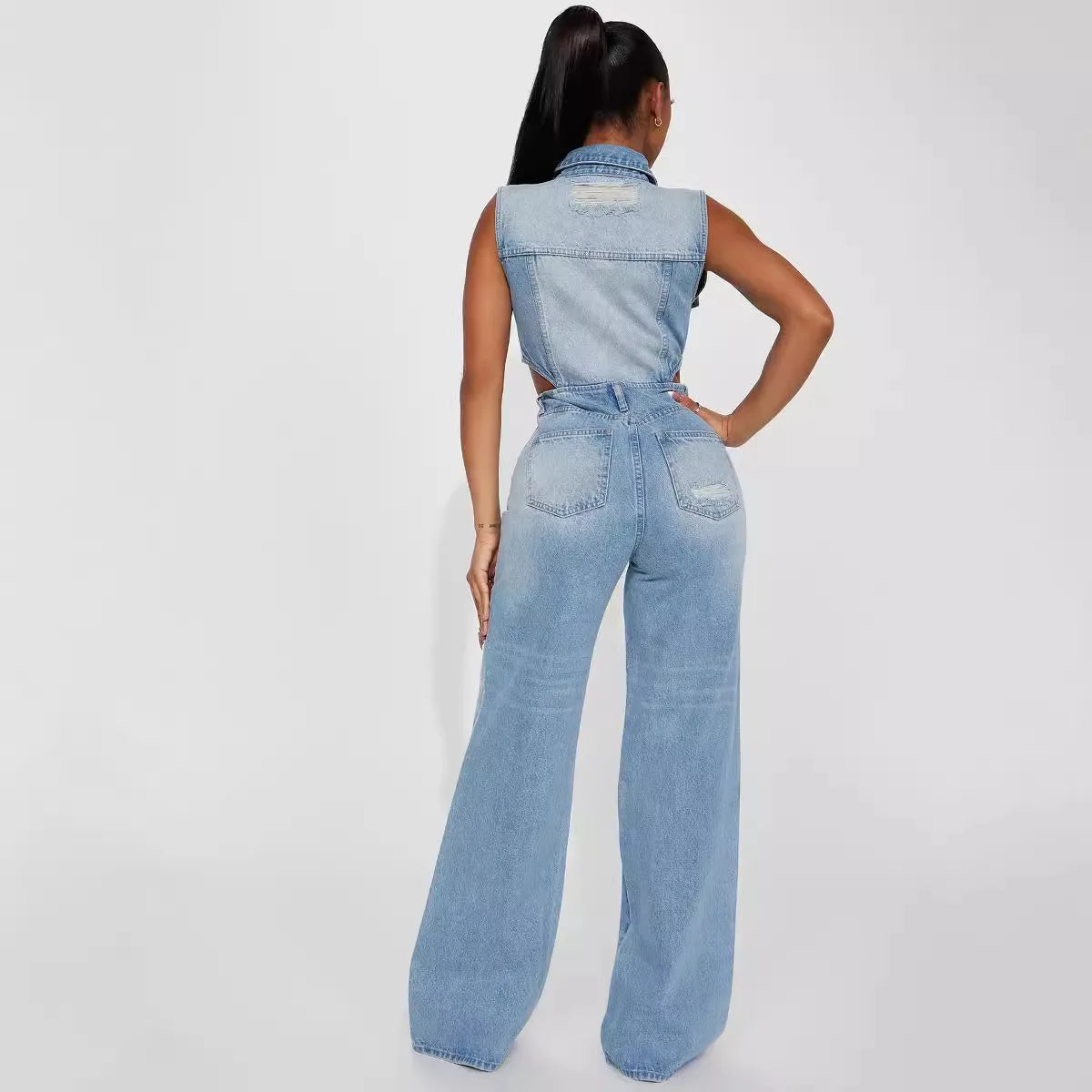European American Sexy Hollowed-out Design Sleeveless Lapel Denim Jumpsuit. New Fashion Straight-leg Jumpsuits for Women Spring
