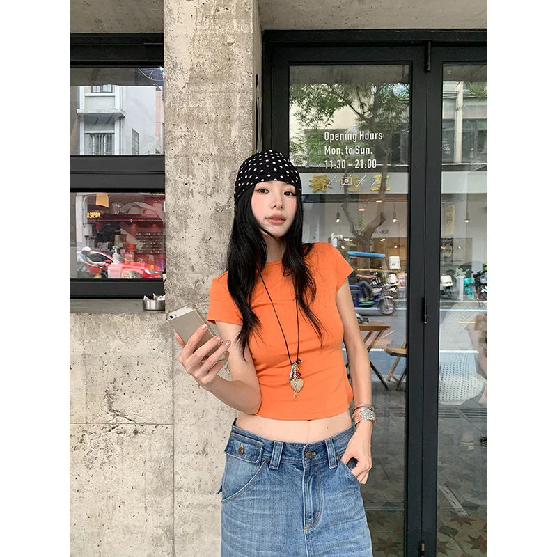 Benuynffy Solid Color Round Neck Crop Top Women 2026 Summer New Korean Style Chic Short Sleeved All Match Casual Y2k Top Tees